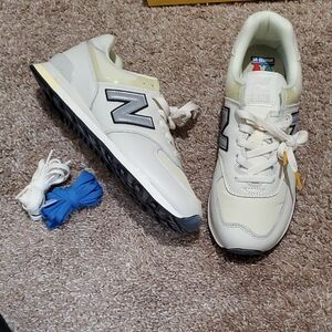 New Balance Cream and Black Sneakers with Blue Laces 574
